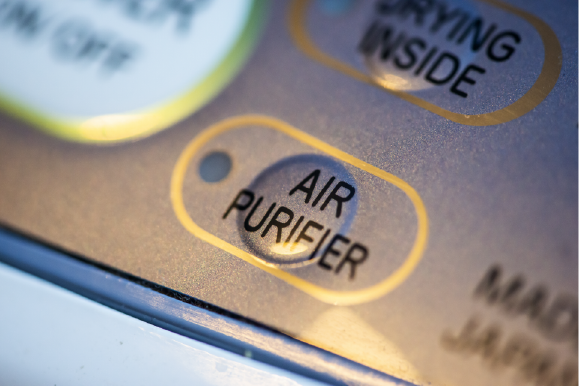 Buttons on purifier device. | Advanced Heating and Air Conditioning
