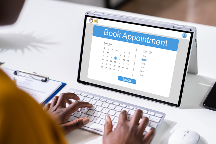 Booking Meeting Calendar Appointment On Laptop Online | Advanced Heating and Air Conditioning